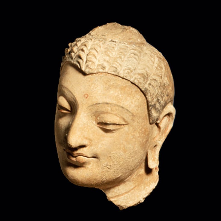 Head of Buddha Shakyamuni. Afghanistan, 4th-5th century. Courtesy of LACMA.