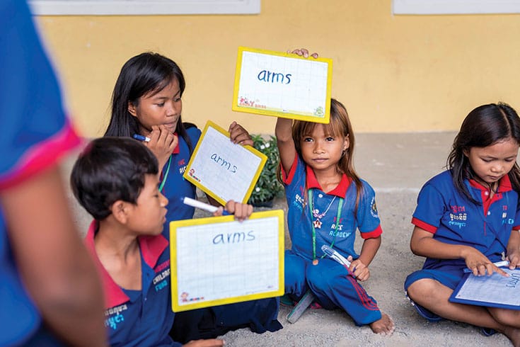 Thanks to CCF, most children in this community of 12,000 are now in school. Here, students proudly display their work in the Early Childhood Education program.