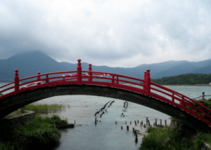The bridge to the land of the dead at Osorezan in Aomori, Japan. Photo by Vera..
