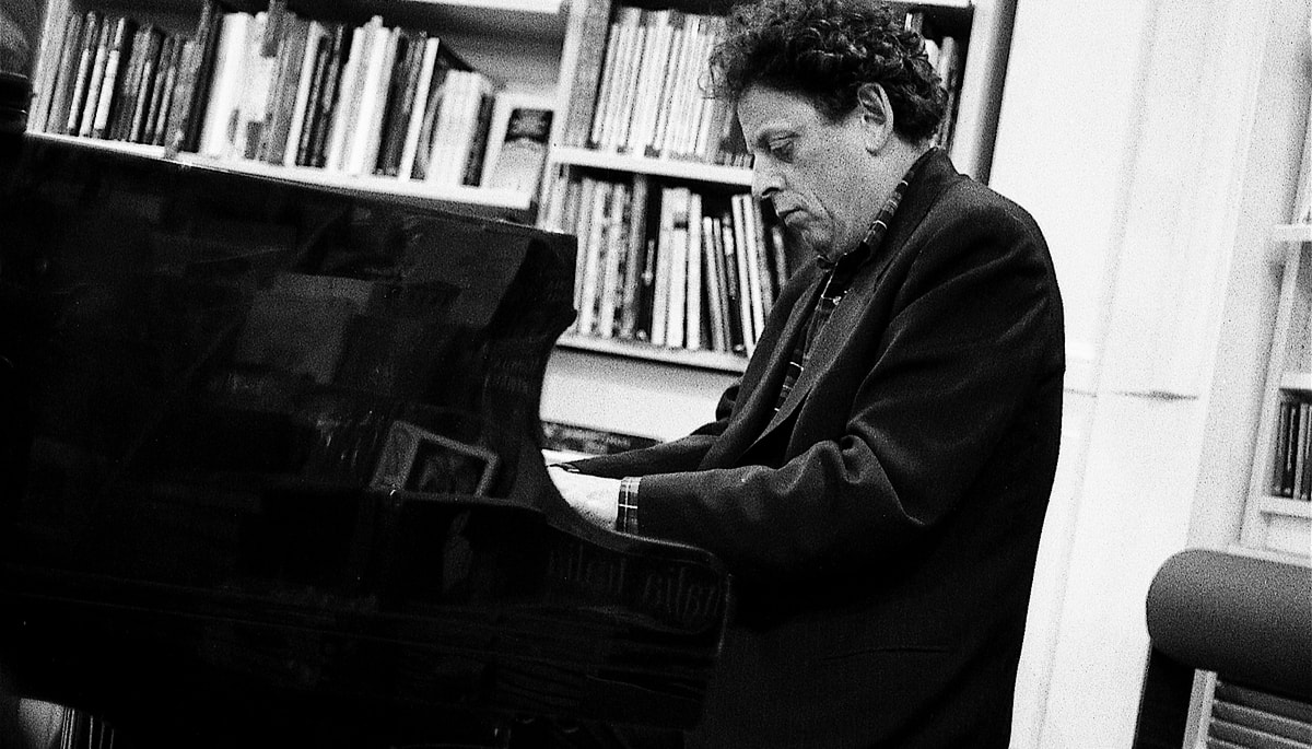 Philip Glass playing the piano.
