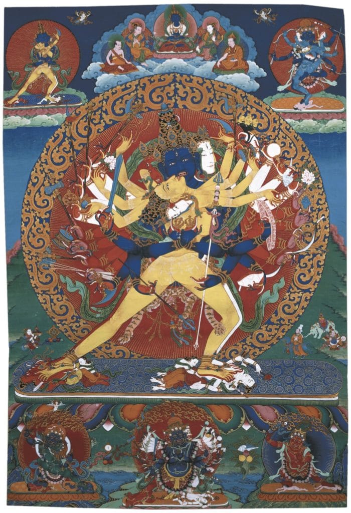 Kalachakra, a semi-wrathful deity in union with consort. Above center is the primordial buddha Vajrasattva flanked by two kings of Shambhala and two lamas; in the upper corners are yidams in union, and at the bottom are several protector deities.