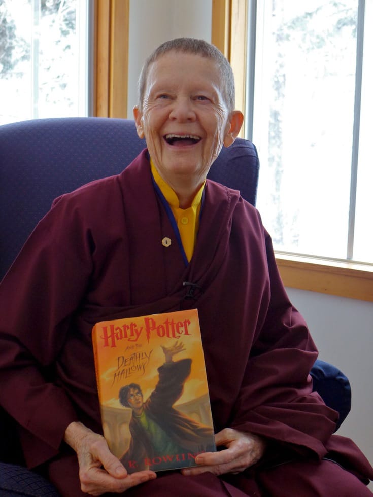 Pema Chodron holding "Harry Potter".