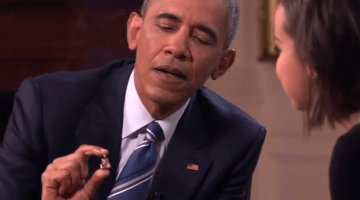 Obama, in White House video, shows the tiny Buddha statuette he "carries around all the time."