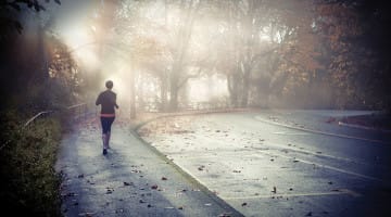 A runner in the fog.