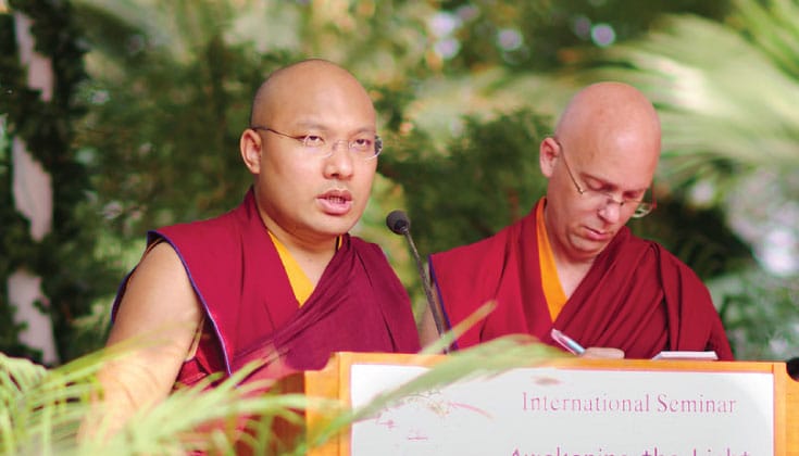 The Karmapa speaking at the "Awakening the Light of Dharma" conference in November, 2015.