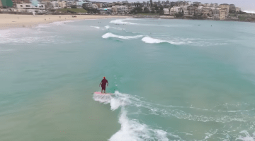 Gyuto monk surfing in Bondi Beach, Australia