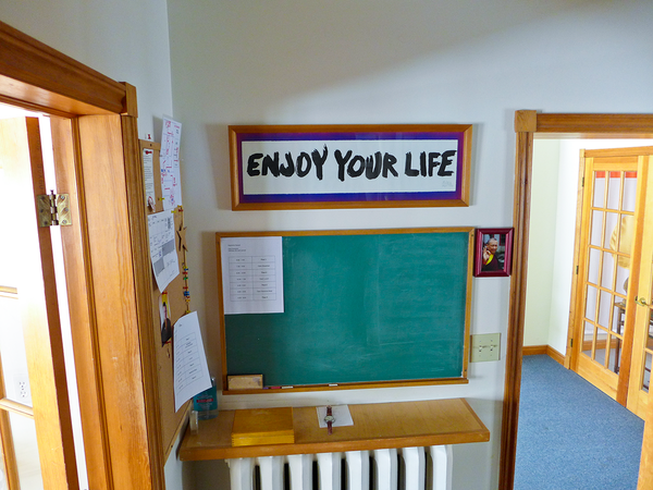 Photo of "Enjoy Your Life" calligraphy hanging at Gampo Abbey.