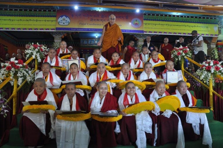 His Holiness the Dalai Lama with the twenty Tibetan Buddhist nuns who received the Geshema degree.