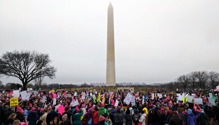 Protesters gather at the The Washington Monument for the Women's March on Washington. Photo by Peter Kaminski.