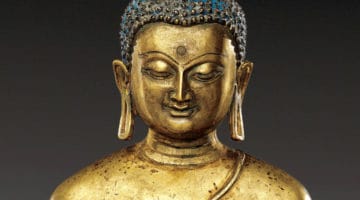 Sculpture of Shakyamuni Buddha sitting and touching the earth.