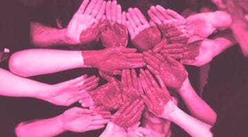 A heart made of painted hands