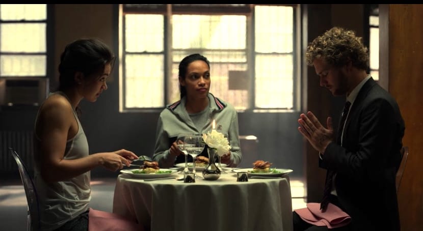Danny Rand says words of gratitude before eating a meal -- as his companions, who apparently have never seen such a thing, look on, mystified. From Marvel's Iron Fist.