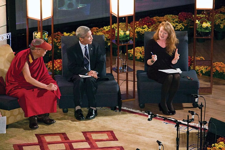 Krista Tippett discusses pursuing happiness with His Holiness the Dalai Lama and translator Thupten Jinpa at Emory University in 2010. Photo by Bryan Meltz / Emory Photo.