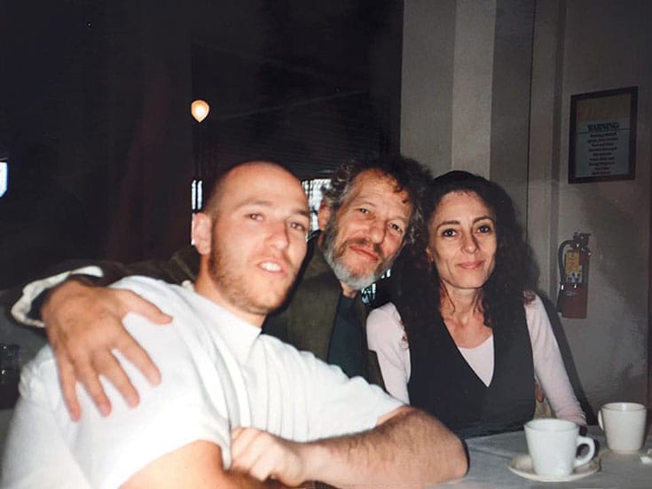 Noah Levine with his father and step-mother, Stephen Levine and Ondrea Levine.