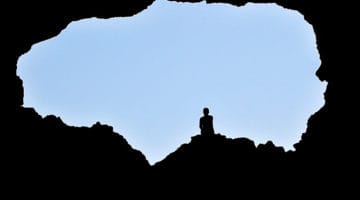 person in cave