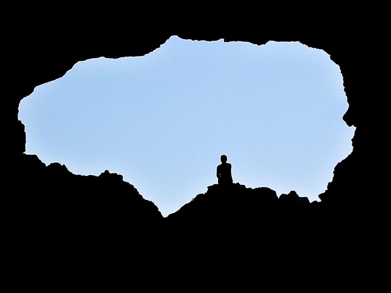 person in cave