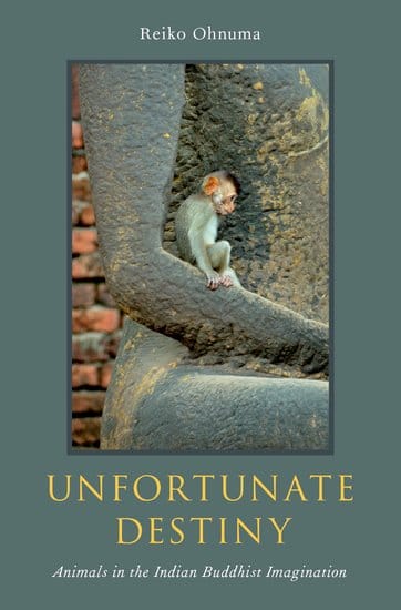 Book cover for "unfortunate destiny." It has a blue-grey background with a photo of a small monkey in the crook of a statues arm.