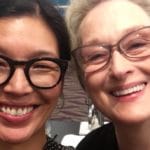 “Aspiring Buddhist” activist Ai-Jen Poo walks Golden Globes red carpet with Meryl Streep