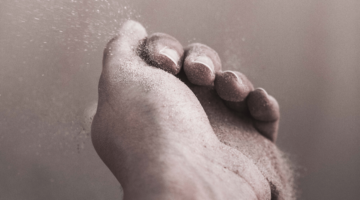 Hand scattering sand