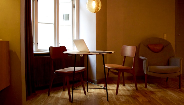 Chairs and table in a neat room.