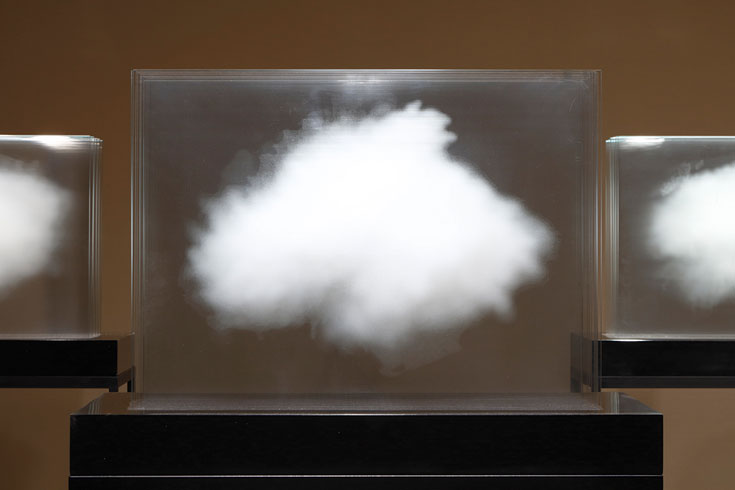 A photo of a cloud in a glass case.