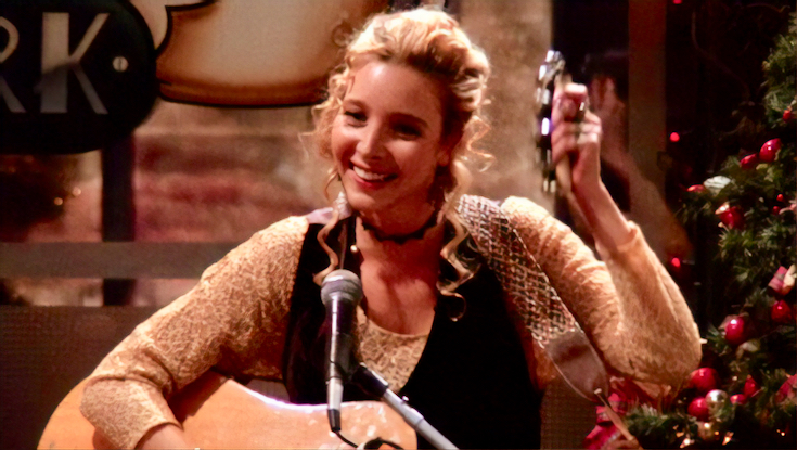 Phoebe Buffay from friends playing guitar