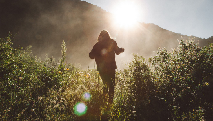 Person walking in field