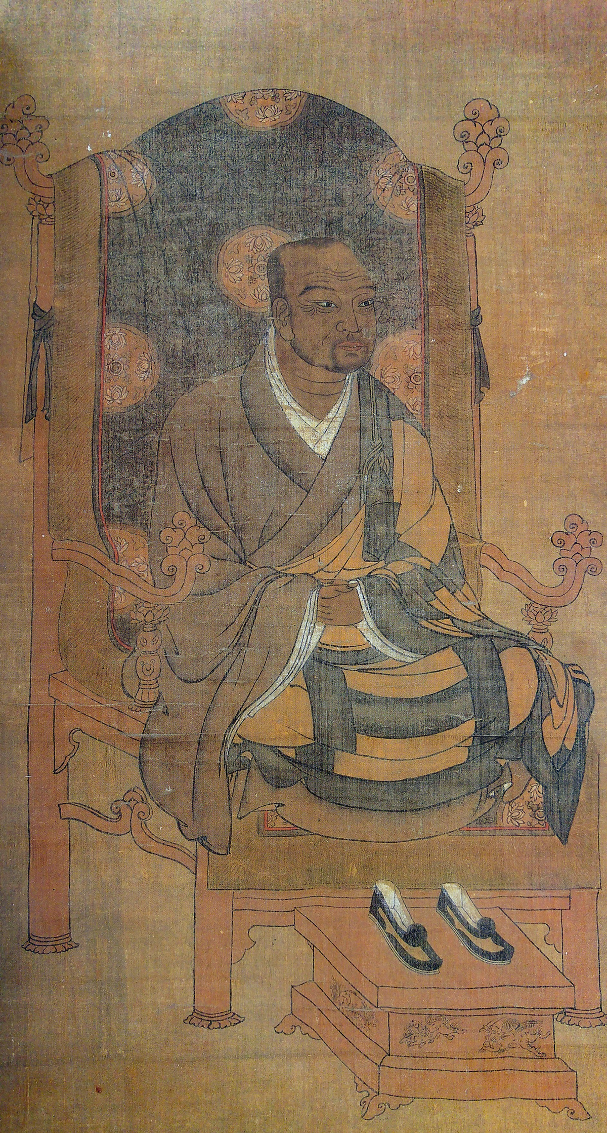 A drawing of a man sitting on a seat.