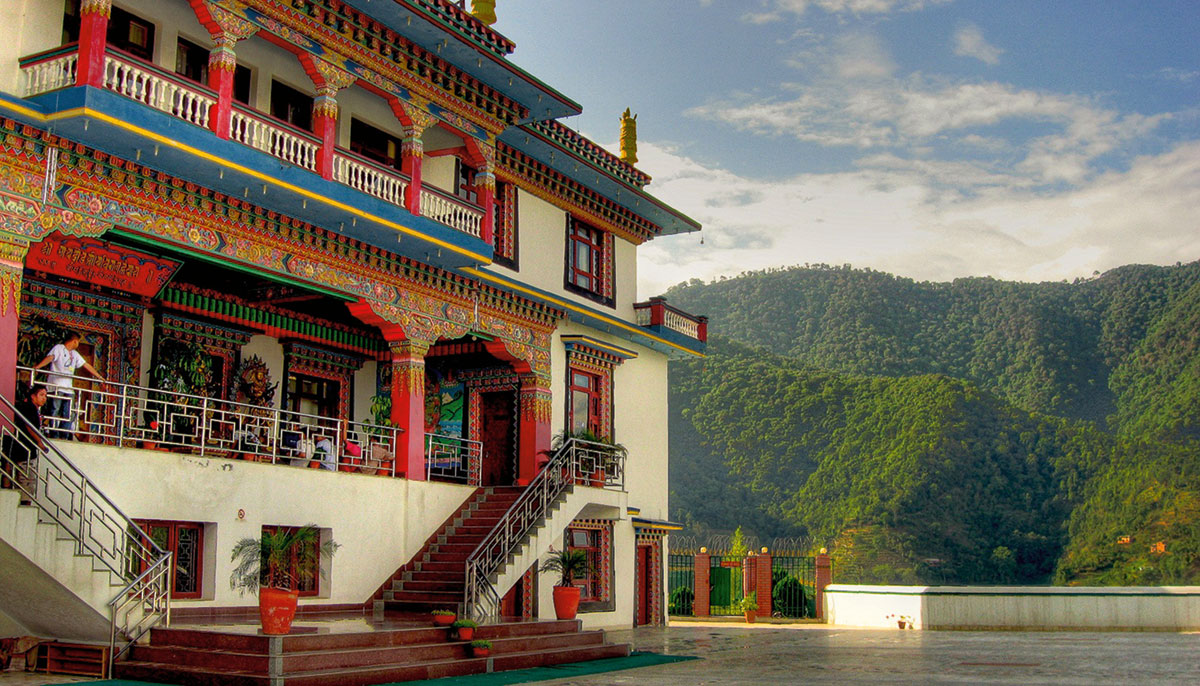 Photo of Druk Gawa Khilwa nunnery with mountains in background