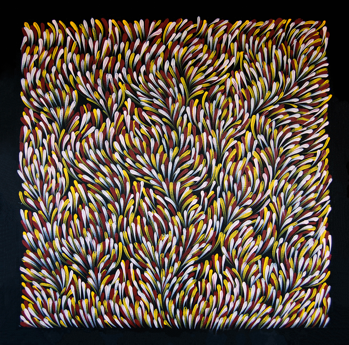 An abstract painting of a bunch of colours, mostly yellow and red and white.