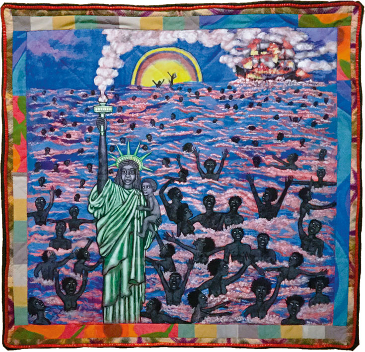 Quilted image of the Statue of Liberty with dreadlocks. She cradles a Black baby in one arm and holds the flaming torch with the other. Behind her dozens of slaves flail in the sea, drowning, while the ship that transported them burns in the background.