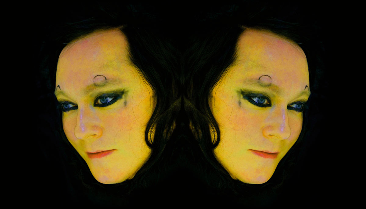 A photo of two faces looking in opposite directions.