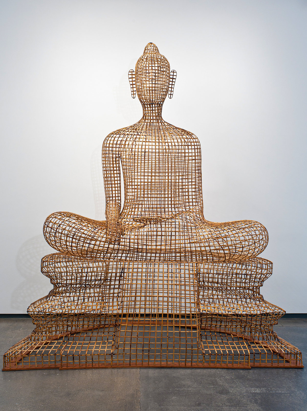 Buddha statue made out of wires.