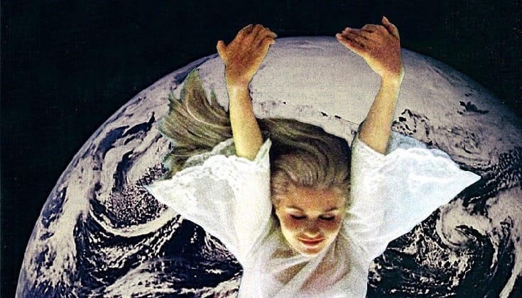 Woman floating over the earth.