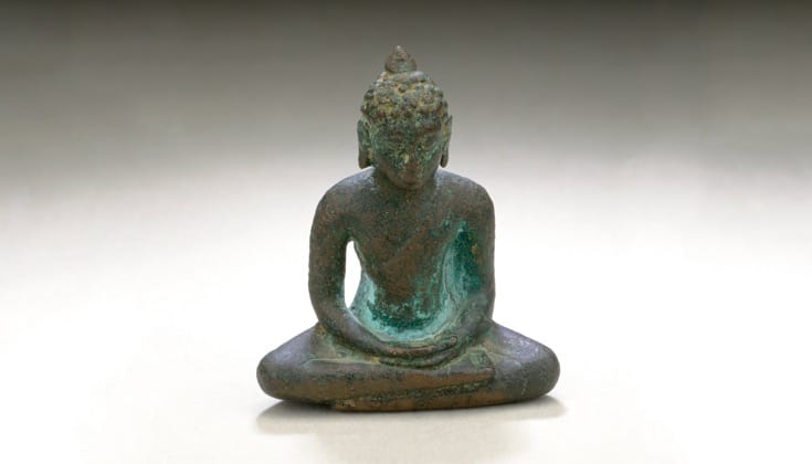 Buddha shakyamuni sculpture sitting in meditation.