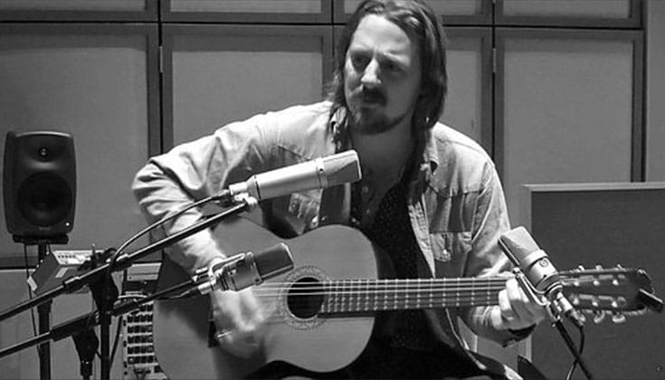 Sturgill Simpson playing guitar.