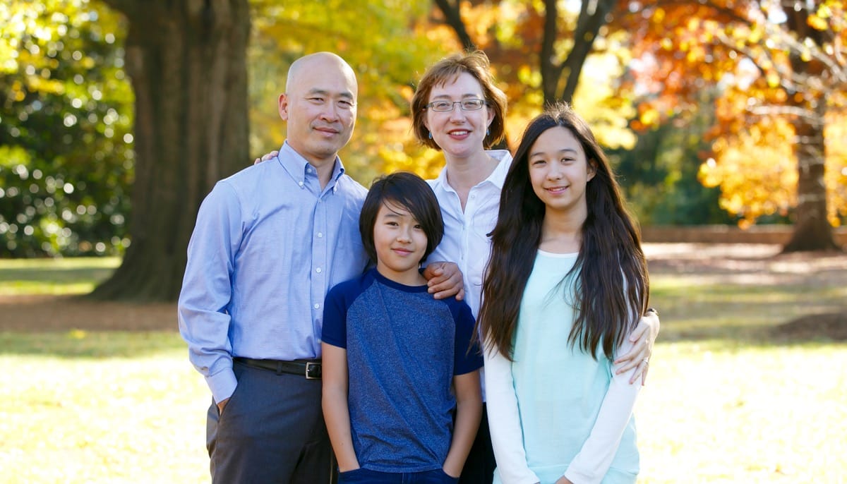 Sumi Loundon Kim with her husband and children.