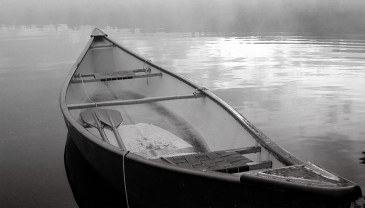 Empty boat in water