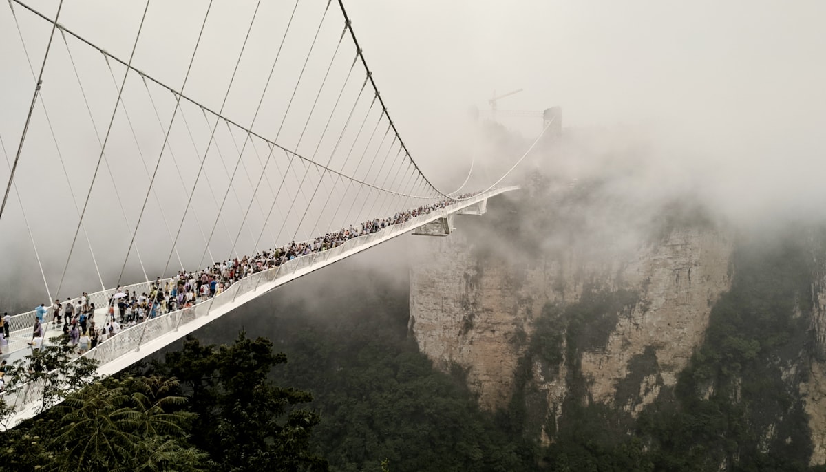 Glass footbridge over a canyon.