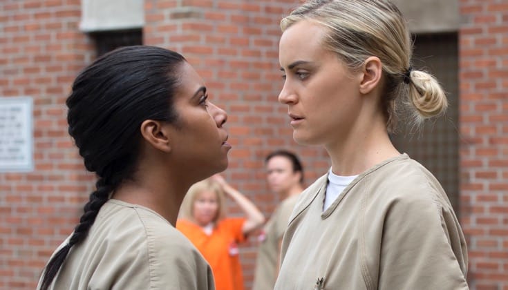 Jessica Pimentel as Maria Ruiz with Taylor Schilling as Piper Chapman on  Orange Is the New Black.