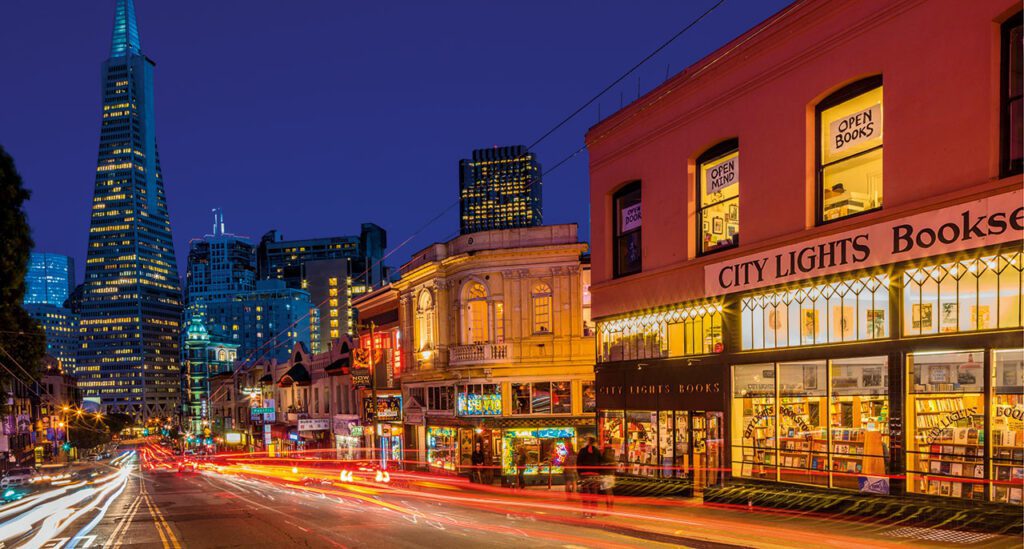 Photo of streetscape and the bookshop City Lights in San Francisco.