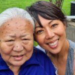 Author Chokey Tsering, smiling, and hugging her mother.