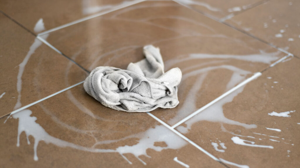 a rug left on floor to wipe spilt milk