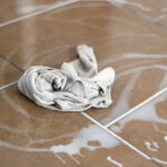 a rug left on floor to wipe spilt milk